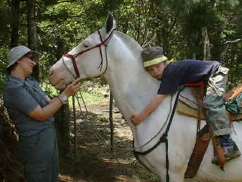 Children getting comfortable with horses